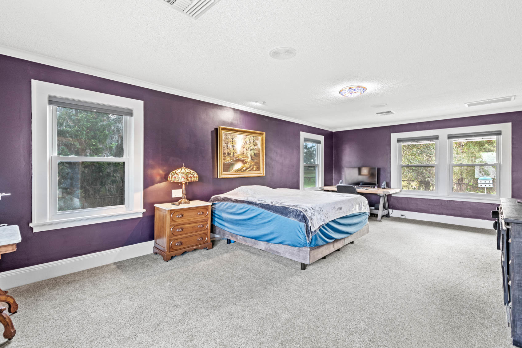 primary bedroom with purple walls